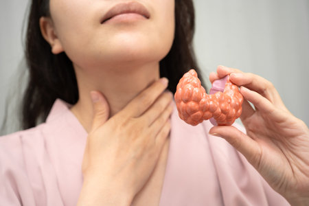 Hyperthyroidism, Overactive Thyroid, Thyroid Lymphoma, Asian woman with thyroid gland human anatomy...