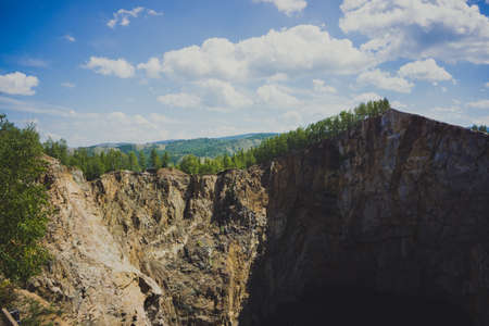view of the open big mountain with blue sky and cloudsの写真素材