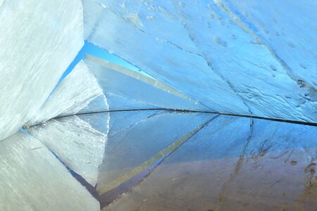kaleidoscope. the abstract background of ice structure. Winter. Ice on the surface of Lake .  Cracks...