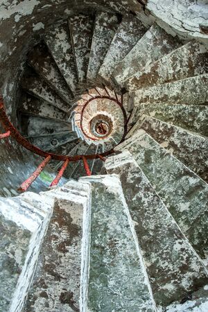 Spiral staircase on a old Lighthouse. Bottom view, look from below