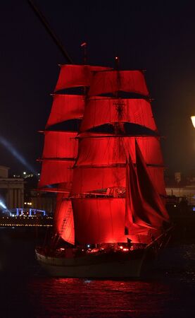 ST.PETERSBURG, RUSSIA - JUN 20, 2015: Light show and firework with a frigate with scarlet sails floating on the Neva River. In 2015, the festival Scarlet Sails celebrates its tenth anniversary. Fireworks over the city of St. Petersburg (Russia) Neva Riverのeditorial素材