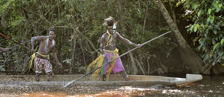 INDONESIA, IRIAN JAYA, ASMAT PROVINCE, JOW VILLAGE - JUNE 23: Canoe war ceremony of Asmat people. Headhunters of a tribe of Asmat . New Guinea Island, Indonesia. June 23, 2016のeditorial素材