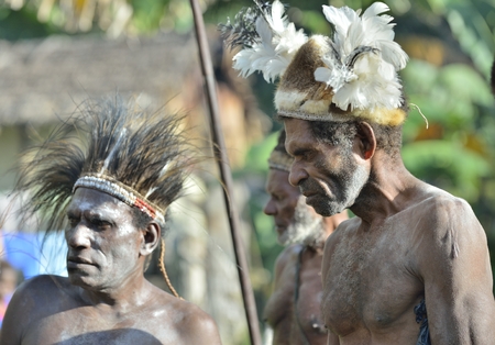 YOUW VILLAGE, ATSY DISTRICT, ASMAT, NEW GUINEA, INDONESIA - MAY 23: Head hunter of a tribe of Asmat....