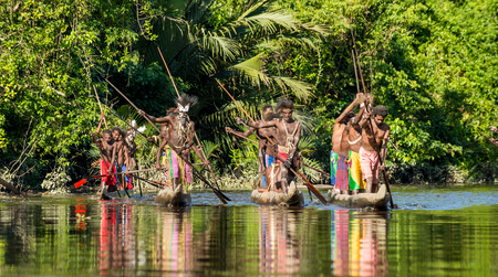 INDONESIA, IRIAN JAYA, ASMAT PROVINCE, JOW VILLAGE - MAY 23: Canoe war ceremony of Asmat people. Headhunters of a tribe of Asmat . New Guinea Island, Indonesia. May 23, 2016のeditorial素材