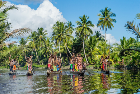 INDONESIA, IRIAN JAYA, ASMAT PROVINCE, JOW VILLAGE - MAY 23: Canoe war ceremony of Asmat people. Headhunters of a tribe of Asmat . New Guinea Island, Indonesia. May 23, 2016のeditorial素材