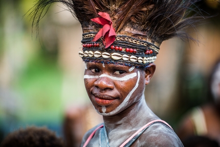 BALIEM VALLEY, WEST PAPUA, INDONESIA, MAY 14, 2016: Portrait of woman with traditional face painting and nation headdress. Dugum Dani tribe. New Guinea, Indonesia on May 14, 2016のeditorial素材