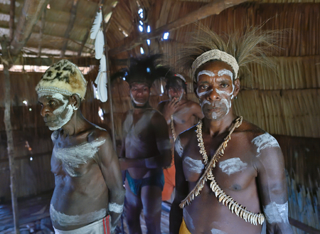 YOUW VILLAGE, ATSY DISTRICT, ASMAT REGION, IRIAN JAYA, NEW GUINEA, INDONESIA - MAY 23, 2016:...