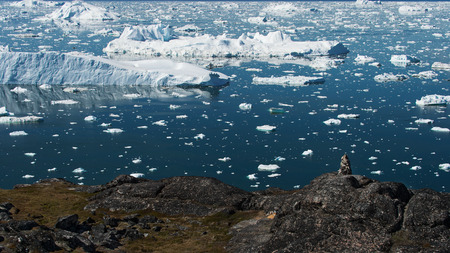 Icebergs are on the arctic ocean in ilulissat icefjord. Nature and landscapes of Greenland.