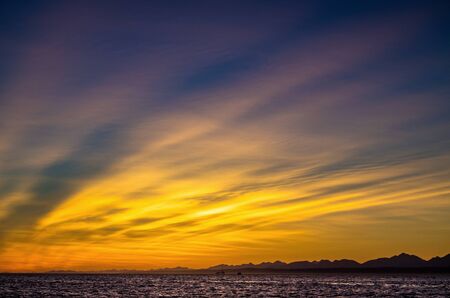 Cloudscape. Clouds, red sunrise sky, Mossel bay. South Africa.の写真素材
