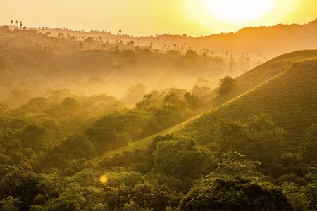 Early foggy morning view of Rinca Island (Komodo National Park), Rinca, Moluccas, Indonesian Maluku,...