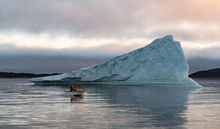 Speedboat and Icebergs in Disko Bay Greenland
