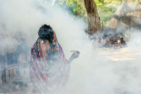 BALIEM VALLEY, WEST PAPUA, INDONESIA, JUNE 15th, 2016: Dugum Dani tribe people are preparing a hole...