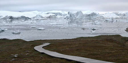 Icebergs are on the arctic ocean in ilulissat icefjord. Nature and landscapes of Greenland.