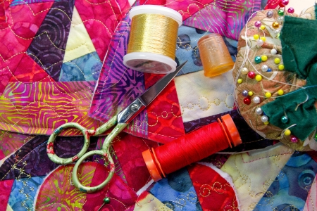Sewing supplies lay amid hand crafted valentines.