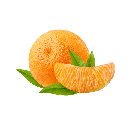 A ripe tangerine and a slice of citrus with green leaves isolated on white backgroundの写真素材
