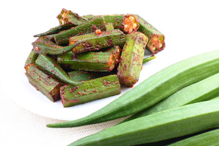 fried okra with raw okraの写真素材