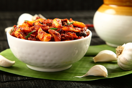 Homemade spicy garlic pickle -Indian cuisineの写真素材