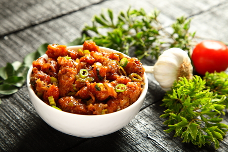 Healthy appetizer- chicken fry 65  with vegetables.の写真素材