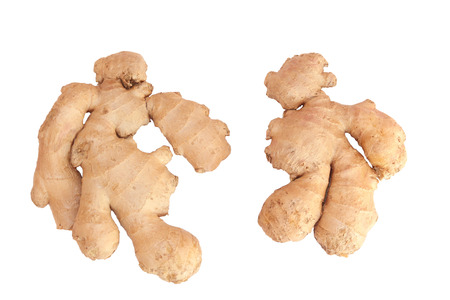 two ginger root figures, isolated on whiteの写真素材