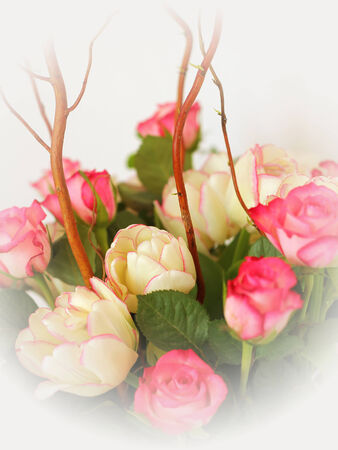 Bouquet of pastel colored tulips and rosesの写真素材