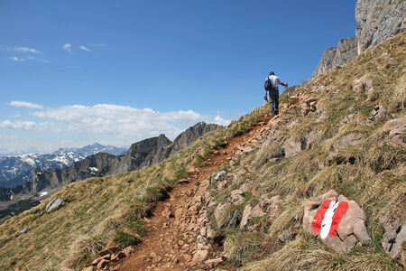 Mountaineer on a hiking trail in the austrian alpsの写真素材