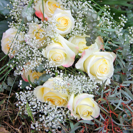 Mourning bouquet of white roses and gypsophila の写真素材