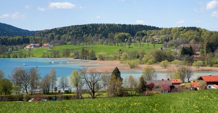 view to idyllic lake tegernsee at springtime, upper bavariaの写真素材