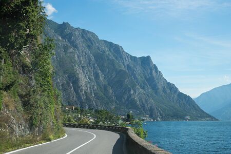 sinuous quayside route along garda lake, italyの写真素材