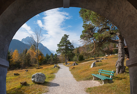 view through stone arch, geologic nature trail near mittenwald, upper bavariaの写真素材