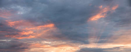 sunset scenery, sky background with pink and gray clouds, in the evening