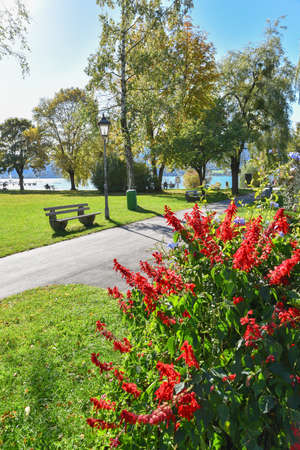 beautiful spa garden Gmund am Tegernsee, with walkway, benches and flowers, tourist destination upper bavariaの写真素材