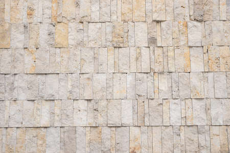 rough stone tile background with natural sandstone, architectural backgroundの写真素材