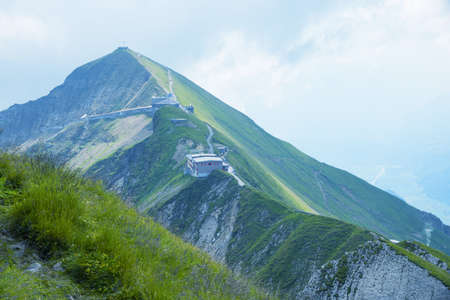 Brienzer Rothorn mountain summit with top station of the cogwheel train, swiss alps, switzerland
