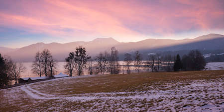Sunset scenery Gmund am Tegernsee, lake and mountain view with dreamy clouds, upper bavarian tourist destinationの写真素材