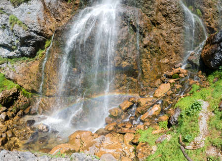 water cascade with rainbow, Dalfazer Wasserfall, near Achensee tirolの写真素材