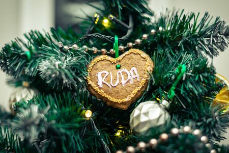 Gingerbread with the words "RUDA" as a Christmas tree decoration.の写真素材