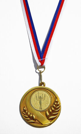 Gold medal on white backgroundの写真素材