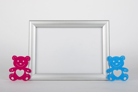 Silver photo frame with childrenの写真素材
