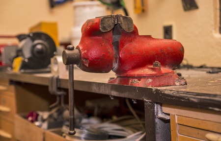 Red vise in the workshopの写真素材