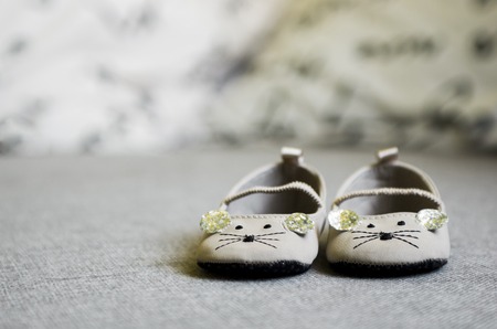 Close up of baby shoes looks like a mouseの写真素材