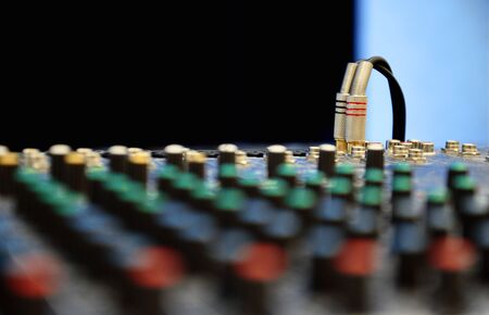 Close up of professional mixing console for music