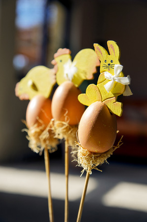Close up of easter decorations with bunny, hen, cock and eggsの写真素材