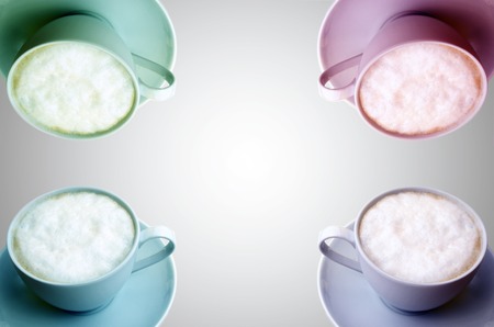 Cups of cappuccino on white backgroundの写真素材