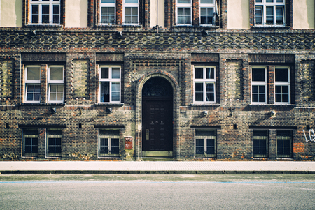 Facade of an old house in Prague. Front door of a vintage building.の写真素材