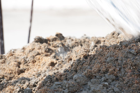 Close up of sand on the beach. Selective focus and shallow depth of field.の写真素材