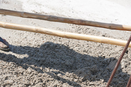 pouring concrete at a construction site, close-up of photo