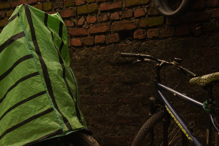 Bicycle in front of a brick wall.の写真素材