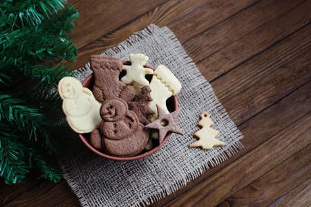 Christmas cookies lies in a bowlの写真素材