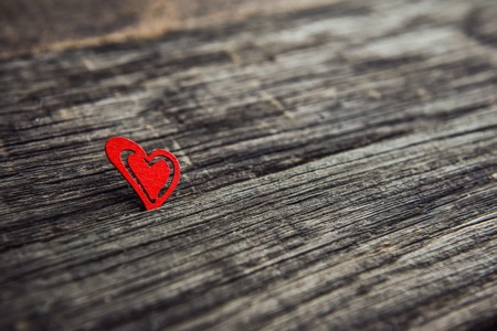 wooden heart on wooden board for valentines dayの写真素材