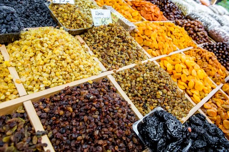 Many varieties of raisins on the counter. Marketの写真素材